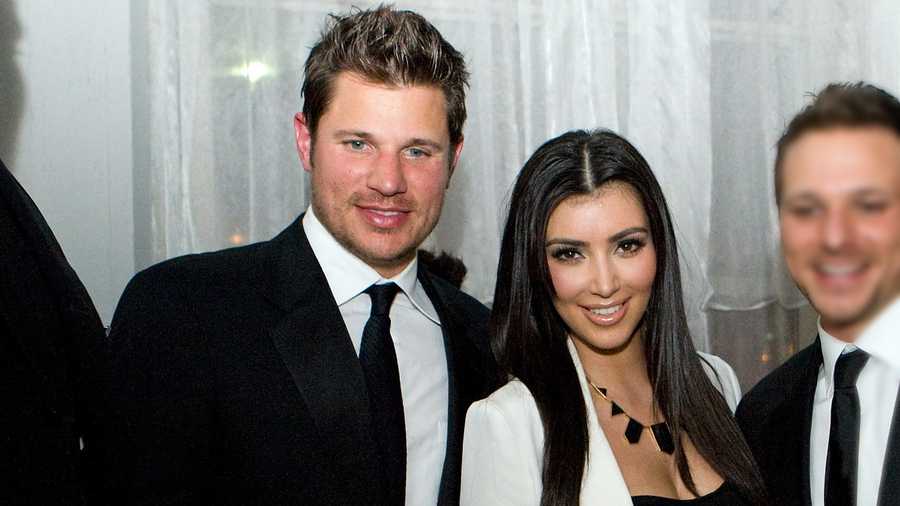 尼克·拉奇(Nick Lachey)和金·卡戴珊(Kim Kardashian)在镜头前摆姿势